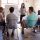 Photo of a team conducting an organizational development exercise at a whiteboard